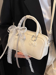 Chic cream bow bowling bag with lace ribbons and sleek leather finish for women