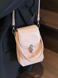 Chic pink crossbody phone bag with woven texture and leather flap for stylish commuting