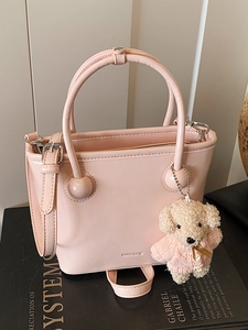 Korean Niche Minimalist Solid Color PU Leather Bucket Bag For Women Commuter Handbag Small Crossbody Bag With Plush Dog Pendant