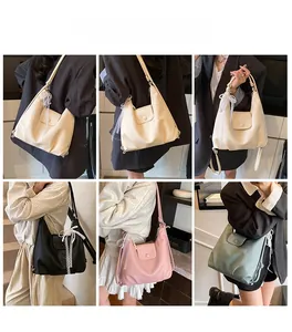 Detail view of versatile tote bags in four colors with pearl bow charms and lace details