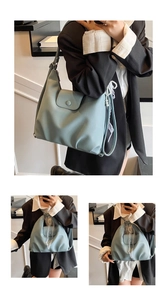 Light blue lychee grain leather tote bag with pearl and white lace ribbon accents