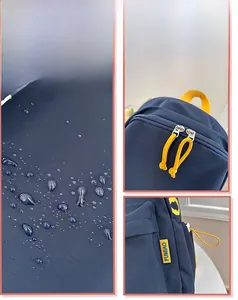 Detail of waterproof fabric with water droplets and contrasting yellow zippers on backpack