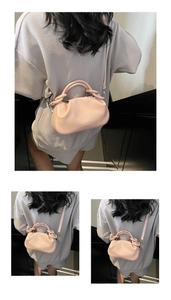 Pink pleated cloud bag detail with handle, crossbody strap and branded metal logo print