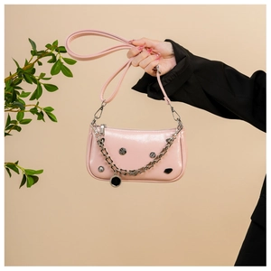 Pink glossy chain bag with metallic beads and black diamond-shaped ornaments detail