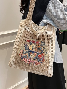 Off-white knit tote bag featuring traditional Chinese dragon embroidery and knotted buttons