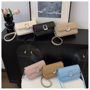 Six colors of rectangular flap crossbody bags with silver metal buckles on display