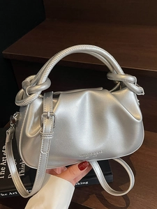 Silver pleated cloud handbag with metallic texture and adjustable shoulder strap for women