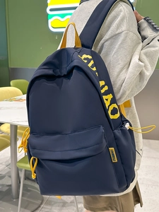 Contrast color navy blue and yellow school backpack for students with large capacity