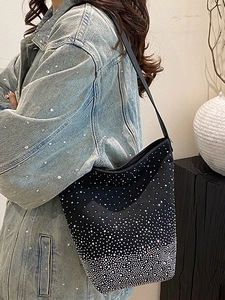 Fashionable black bucket bag with gradient silver rhinestones and leather strap