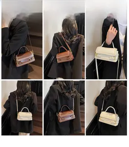 Detailed views of vintage leather crossbody bag with stitching and adjustable metal buckle