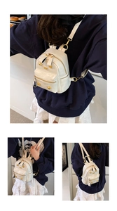 Detail view of mini white PU leather backpack featuring gold rivets and versatile straps