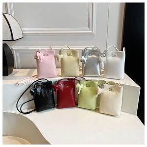 Detailed display of mini crossbody phone bags in eight vibrant colors with M logos