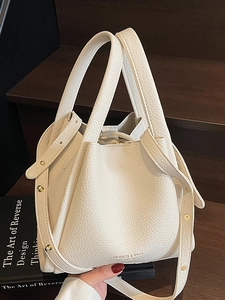 Minimalist beige lychee pattern tote bucket bag with dual handles and crossbody strap