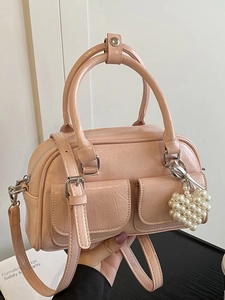 Pink pleated Boston bag with heart pearl charm and adjustable shoulder strap