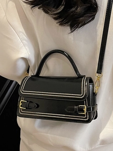French vintage black leather crossbody bag with pearl trim and gold buckle accents