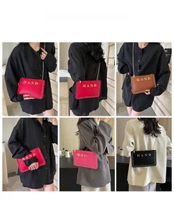 Detail of trendy woven handbag colors including red, coffee, pink, and black options