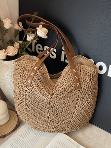 Large capacity straw tote bag with V-shaped hollow weave and brown leather handles