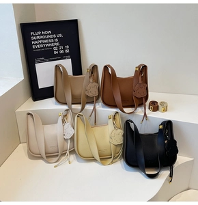 Litchi pattern leather hobo bags in five colors with cute dog charms and wide straps
