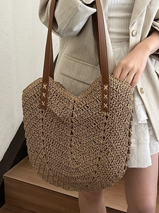Large capacity woven straw tote bag with brown leather straps for summer beach vacations