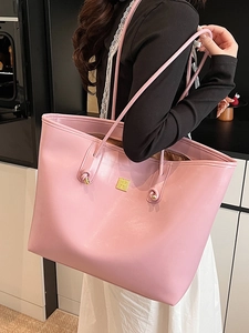 Pink faux oil wax leather tote bag with large capacity and elegant gold logo hardware
