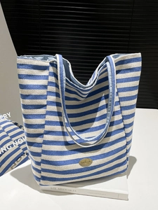 Blue and white striped canvas tote bag with handmade metal plaque and double shoulder straps