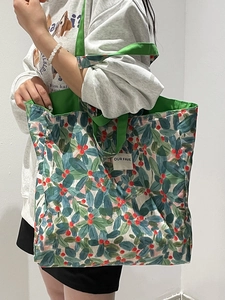 Large capacity canvas tote bag with green holly leaf print and woven straps