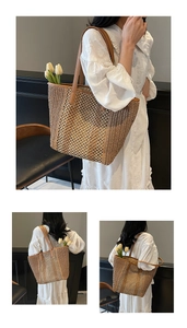 Detail of hollow-out straw tote bag with brown leather straps and contrast weaving