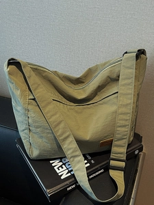 Japanese style olive green nylon tote bag with wide strap and large capacity