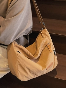 Minimalist large khaki tote bag with wide strap for casual daily commuting women