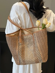 Artistic hollow contrast color straw tote bag with brown leather straps and summer vibe