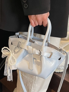 High-quality pleated bucket bag with pearl lace charm and shiny faux leather finish