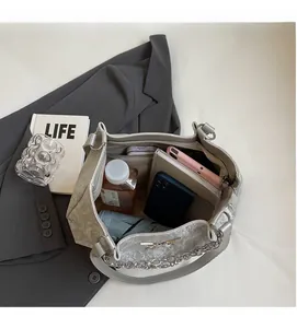 Detail view of wave pattern tote bag interior showing ample storage for daily essentials
