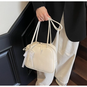 Chic cream white underarm bag with elegant pearl lace bow detail and dual straps