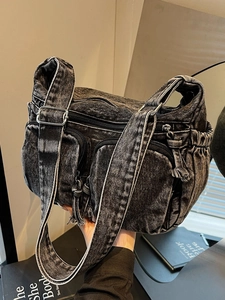 Fashionable dark grey washed denim crossbody bag with multiple pockets and adjustable strap