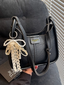 Retro black leather underarm bag with elegant pearl lace bow charm for women