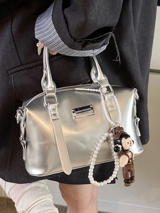 Silver Boston handbag with pearl chain and fashion logo in retro minimalist style