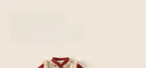 Detail of red Chinese New Year outfit featuring traditional knot buttons and faux fur trim
