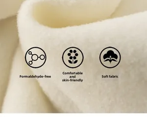 Close-up of soft white fleece fabric showing plush texture and formaldehyde-free quality