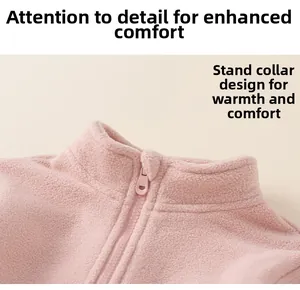 Detail view of the soft pink fleece collar with a high-quality zipper for winter warmth
