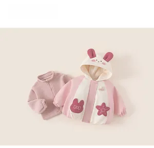 Close-up of pink fleece liner and hooded jacket with rabbit ears for girls
