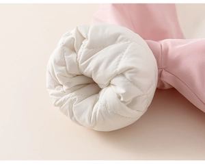 Detail of pink windproof sleeve with white quilted lining and warm fleece padding