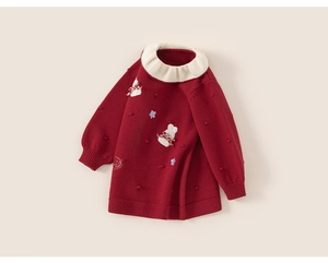 Detail of red knit dress featuring a white ruffled collar and 3D bunny applique
