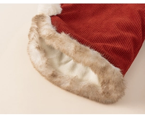 Close-up of red winter garment showing thick faux fur lining and corduroy texture detail