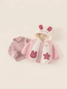 Winter baby girl two-piece outfit featuring a pink fleece liner and cute bunny hooded coat