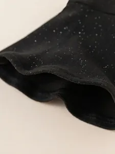 Haut noir scintillant pour fille avec paillettes brillantes et manches évasées pour fête