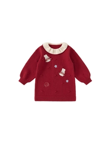 Red knitted girls dress with white lace collar and 3D dot texture in a flat lay view
