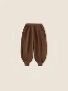 Coffee brown fleece-lined jogger pants for boys with elastic waist and ribbed cuffs