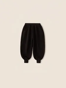 Thick black joggers for boys featuring elastic waistband and ribbed cuffs for winter warmth