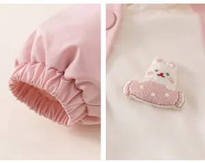 Detailed view of pink toddler jacket with ribbed cuffs and 3D bunny embroidery detail
