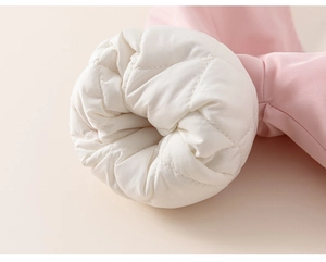 Detailed close-up of quilted pink baby winter jacket showing soft fabric and thick padding
